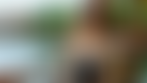 Blurred content preview