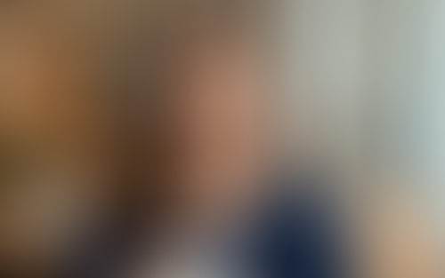 Blurred content preview