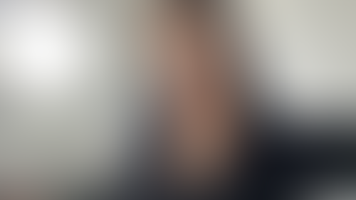 Blurred content preview